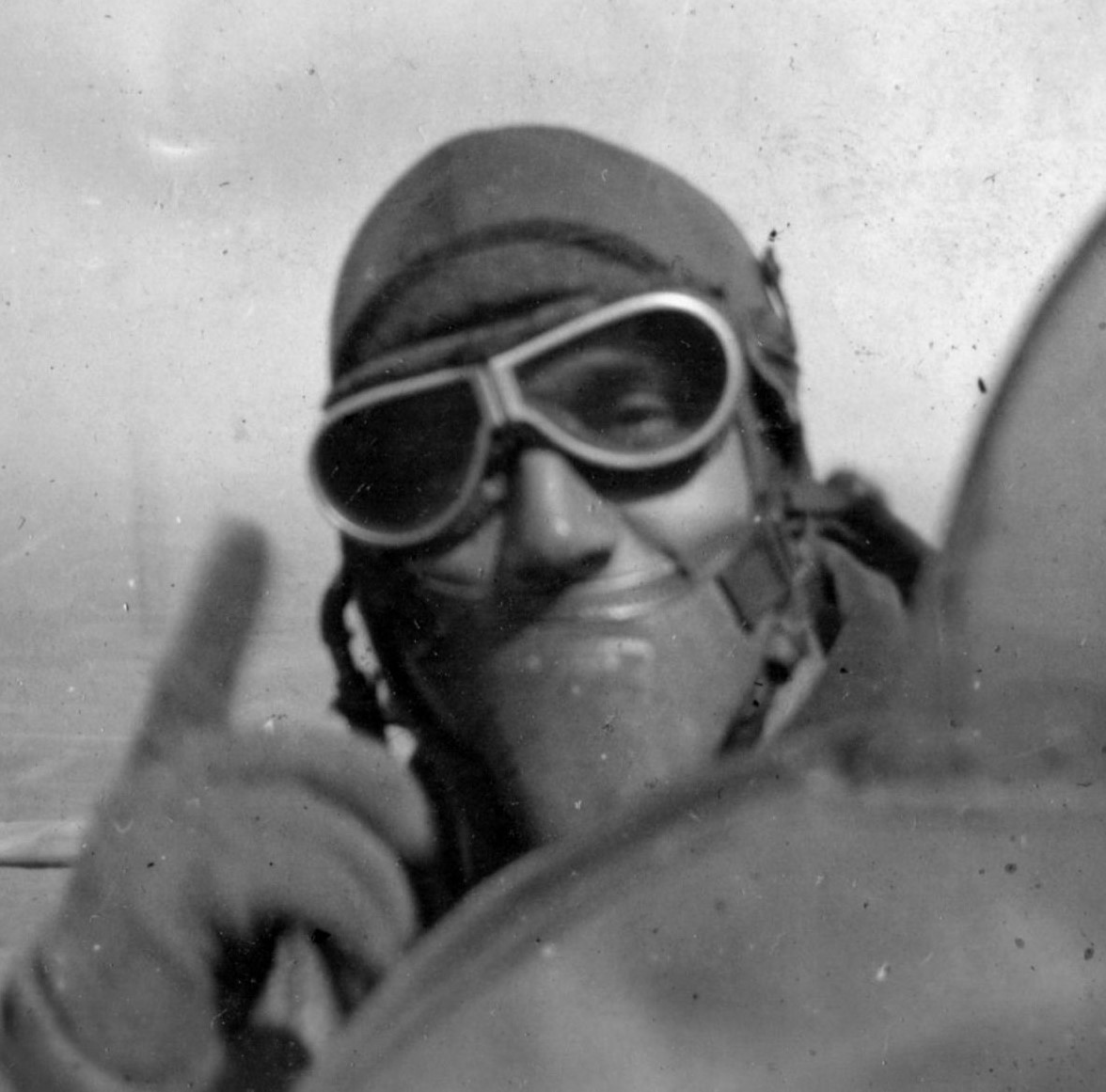 WW1 pilot in cockpit of his aircraft while flying